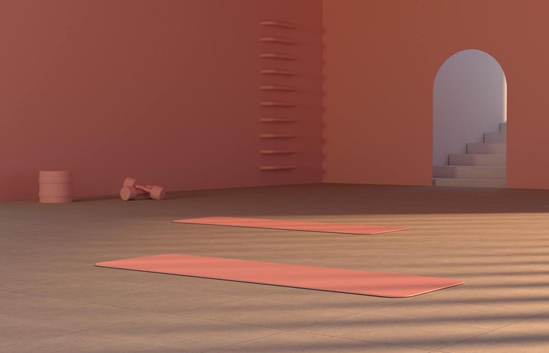 Clean minimalist yoga studio with soft lighting