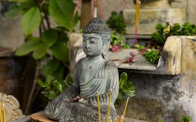 Meditation corner with incense and a small plant